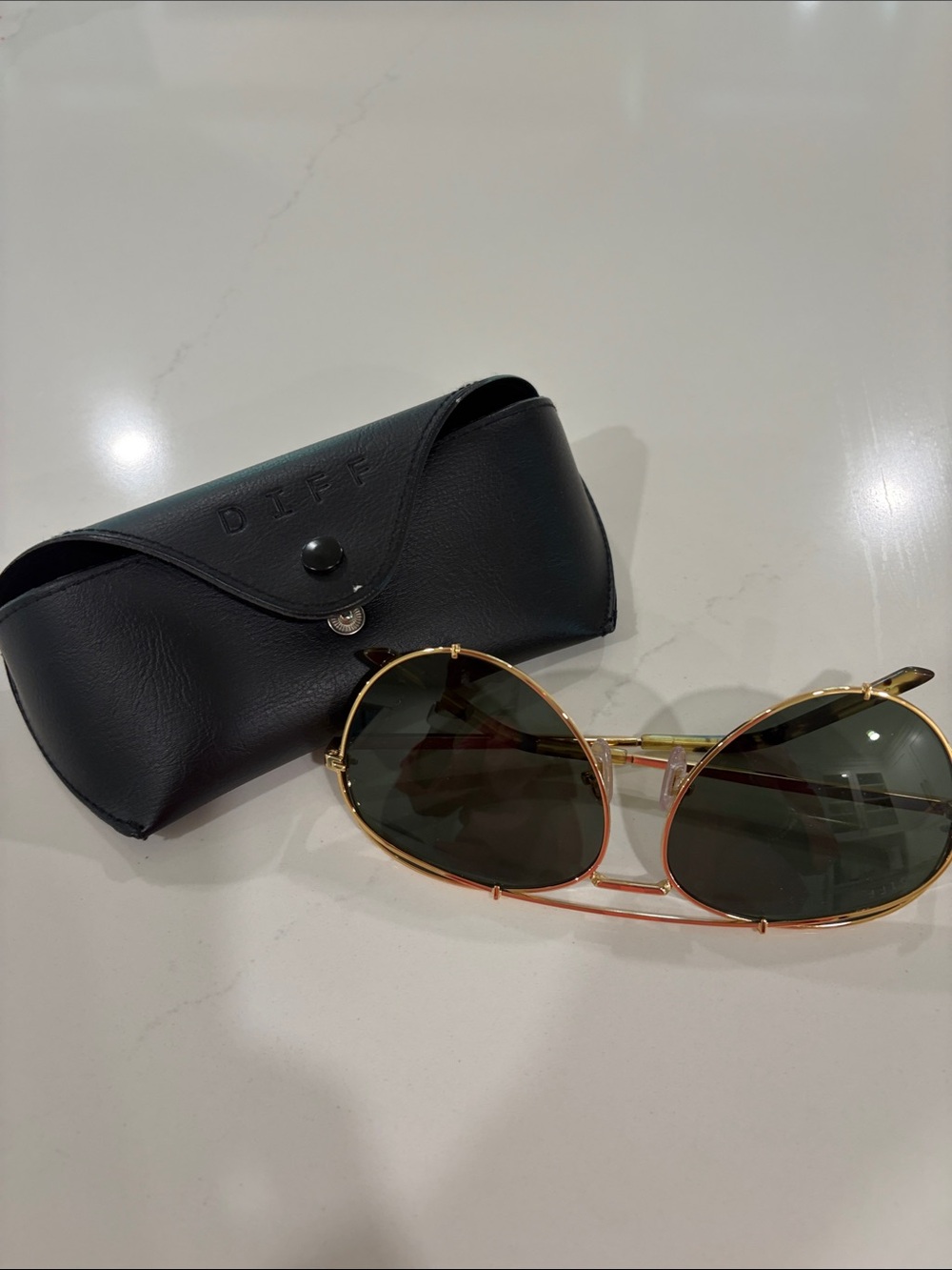 Women’s Gold Frame Sunglasses with Green Lenses